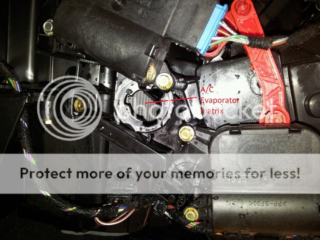Re-connect the drain tube to the elbow and repalce the rubber plug.